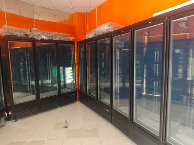 many glass doors that are open in a room