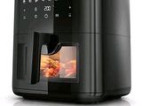 an image of a black air fryer sitting on top of a counter