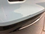 a close up of the front bumper of a car