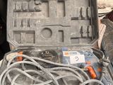 a tool in the case that is sitting on the floor