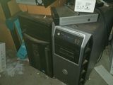 a pile of computer equipment sitting on top of a pile of boxes