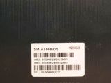 a close up of the back of a cell phone with a barcode on it