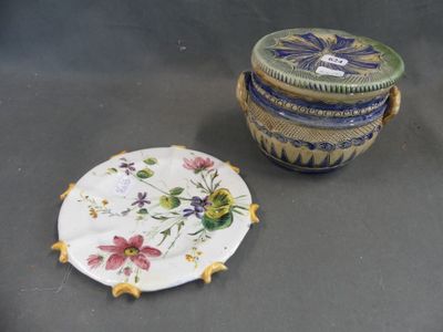 two plates and a bowl sitting on a table