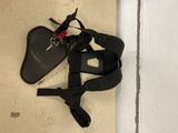 a pair of sandals and a pair of flip flops laying on the floor