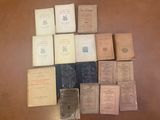 a lot of old books on the table together