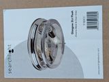 a picture of a box with a silver object inside of it