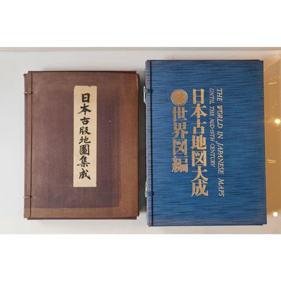 two books that are sitting next to each other on a table