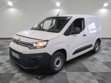 the white van is parked on a checkered tile floor