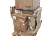 many boxes stacked on top of each other on a pallet