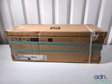 three boxes are stacked on top of each other on a table