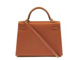 a brown handbag on a white background