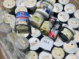 a cart full of cans of food sitting on a table