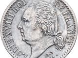 une vieille pièce d'argent portant une tête de femme
