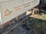 a tractor that is parked on the side of the road