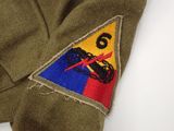 a close up of a jacket with a patch on it