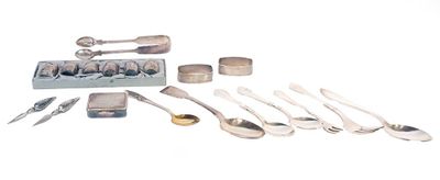 a lot of spoons and spoon knives on the table