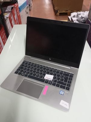 a laptop that is sitting on a table in a store
