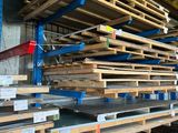 a lot of pallets that are stacked up in a warehouse
