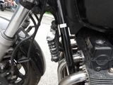 a motorcycle that is parked on the side of the street
