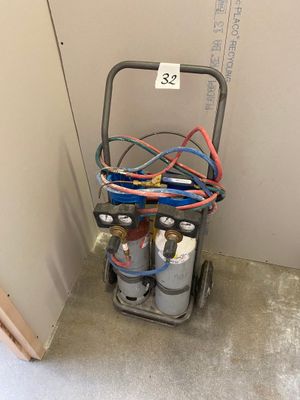 a cart that has a bunch of wires on top of it
