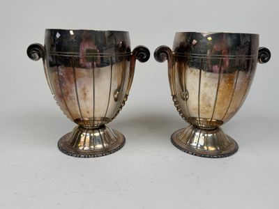 pair of antique silver plated vases with handles and handles