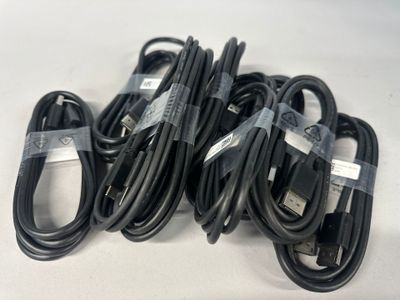 a lot of cables that are sitting on a table