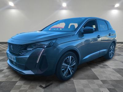 a blue 2020 cadillac suv is parked in a room with a checkered floor