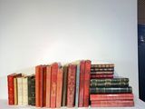a lot of books that are sitting on a table