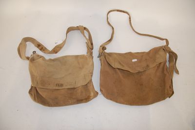 pair of brown leather purses on white background with strap