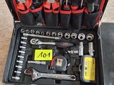 a tool case with tools in it sitting on the floor