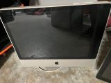 an apple desktop computer sitting on top of a table