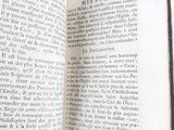 an open book that is sitting on a table