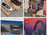 several different pictures of headphones on display in a store