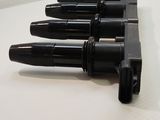 several pens are lined up on top of a white table
