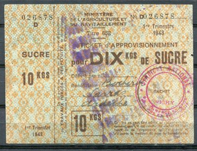 un vieux billet sur lequel figure la photo d'un homme