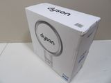 a white box with a black logo on it on a table