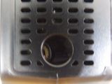a close up of a toaster on a white surface