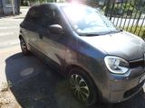 a small car parked on the side of the road