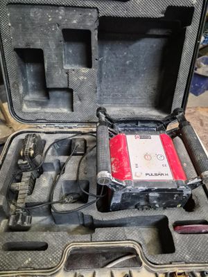 a case with tools inside of it on a table
