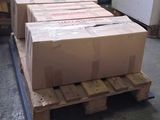 many boxes on a pallet in a warehouse