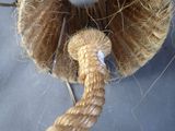 a rope with a knot on top of it on a table