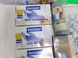 several toothbrushes, toothpaste, toothpaste, toothpaste, toothpaste, toothpaste, toothpaste, toothpaste