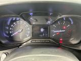 a close up of a car dashboard with a speedometer and gauges
