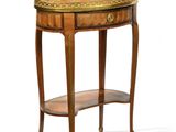 a small table with a shelf on top of it