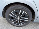 a close up of a tire on a car ' s rim