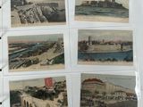 a picture of a collection of old postcards on a table