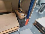 a room with a lot of boxes and boxes on the floor
