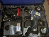 a blue case with tools in it sitting on the floor