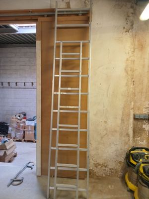 a ladder that is leaning against a wall in a room