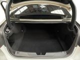 a trunk of a car with the back door open